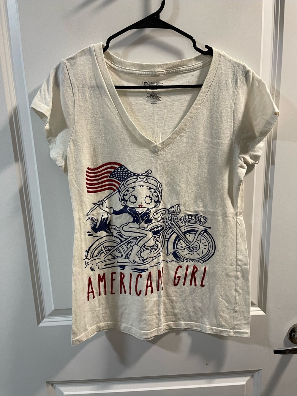 Betty Boop Cream Tee with Red & Blue Motorcycle Graphic Have Spots